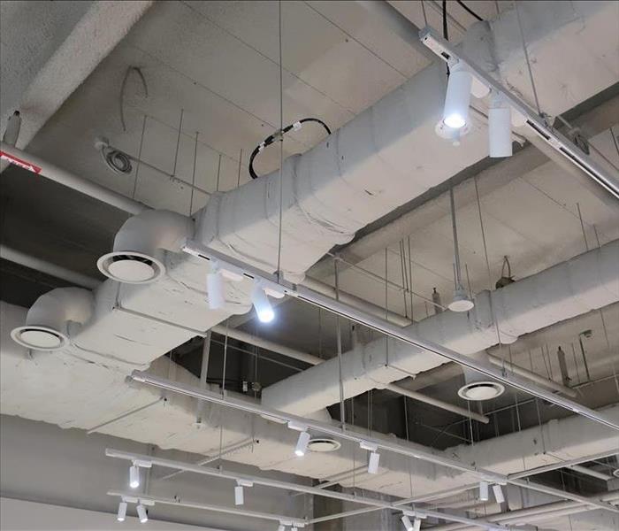 Large commercial warehouse showing the HVAC ductwork